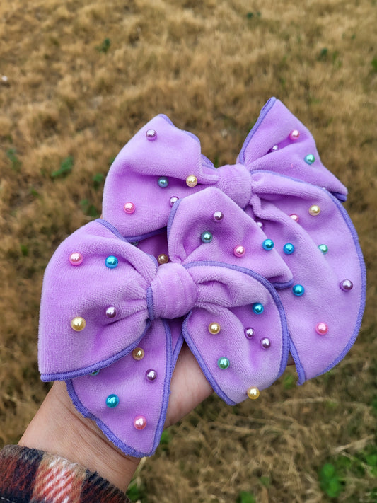 Purple soft bow with beads