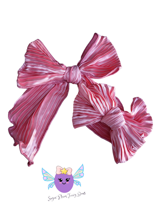 Shiny pink bow